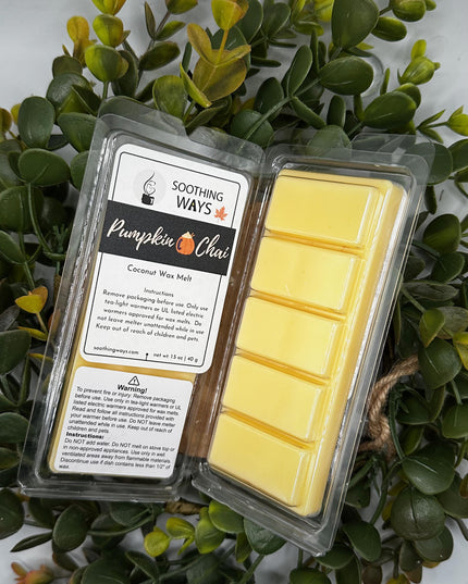 a close up of a sign with a potted plant on it 