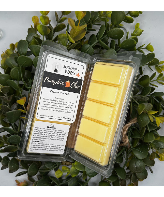 a close up of a sign with a potted plant on it 